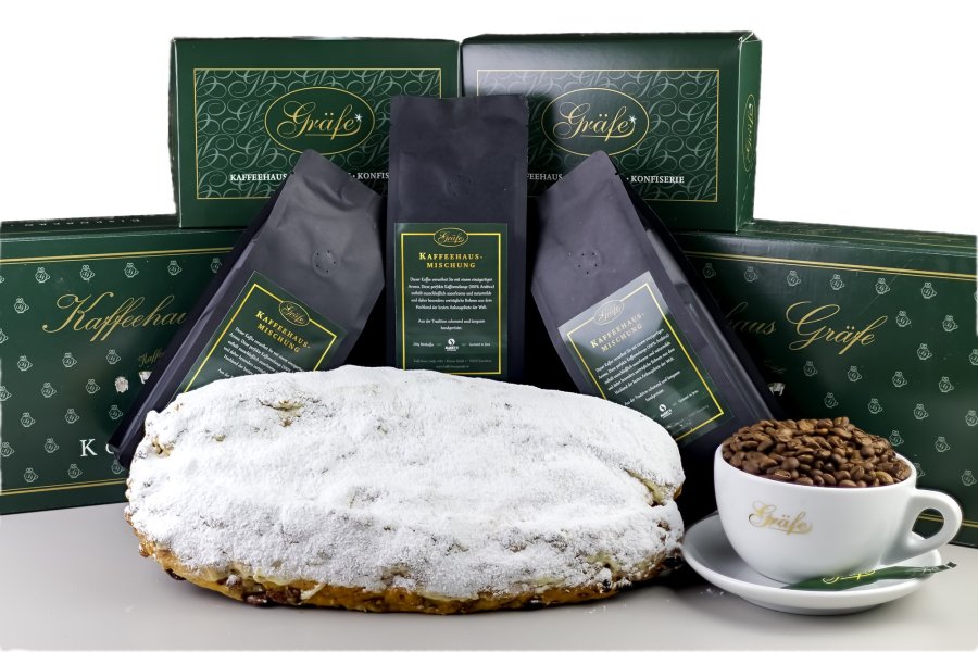 Gräfe Stollen mit Kaffee vor den Gräfe-Geschenkkartons